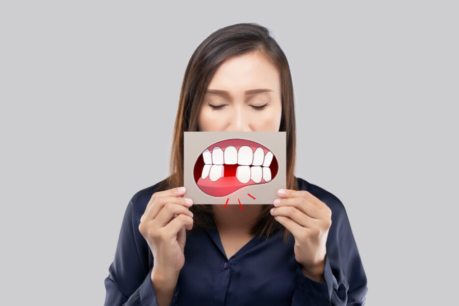 dente com perda óssea